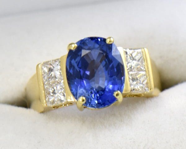 estate cocktail ring with 6ct cushion blue sapphire and princess diamonds in 18k yellow gold 3.JPG