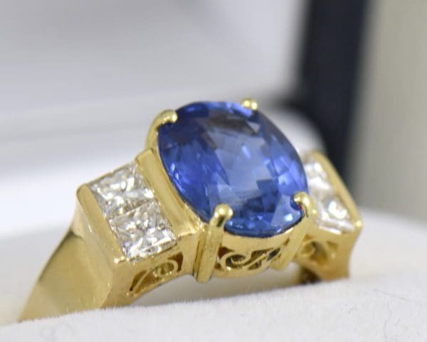 estate cocktail ring with 6ct cushion blue sapphire and princess diamonds in 18k yellow gold 5.JPG