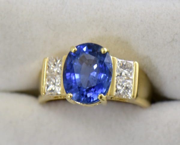 estate cocktail ring with 6ct cushion blue sapphire and princess diamonds in 18k yellow gold 7.JPG