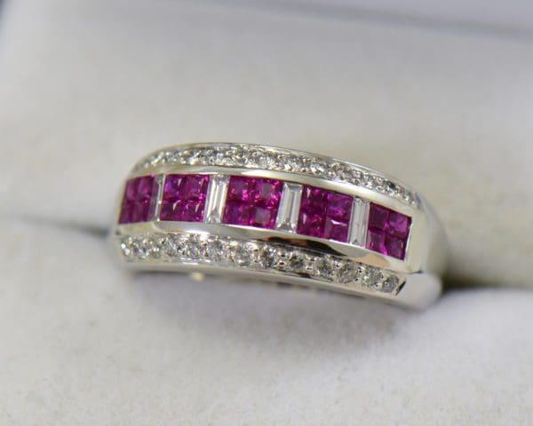 estate levian ring with invisiset rubies and baguette diamonds.JPG