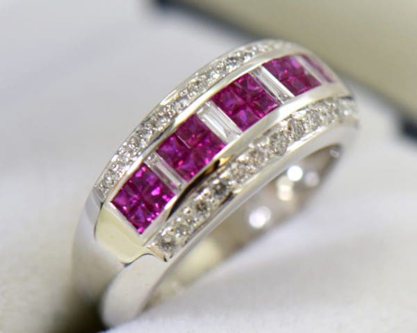 estate levian ring with invisiset rubies and baguette diamonds 4.JPG