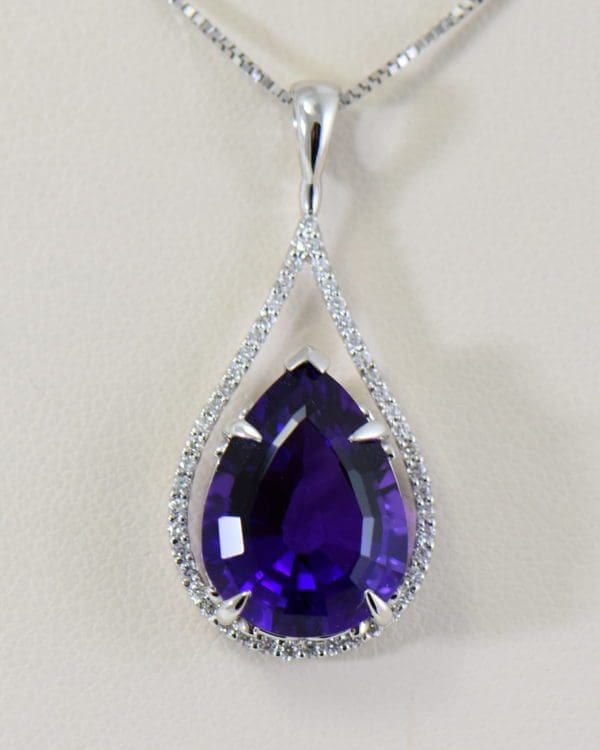 siberian amethyst pear shape set into diamond frame pendant 2.JPG