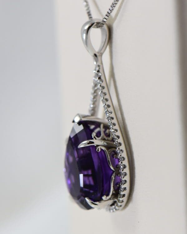 siberian amethyst pear shape set into diamond frame pendant 4.JPG