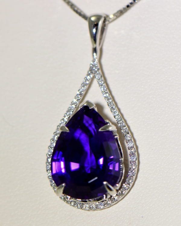 siberian amethyst pear shape set into diamond frame pendant 6.JPG