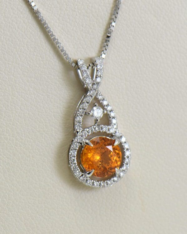 tanzanian spessartite orange garnet and diamond pendant.JPG