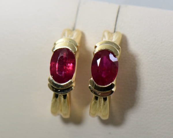 top gem natural ruby earrings set in yellow gold j hoops 2ctw ovals.JPG
