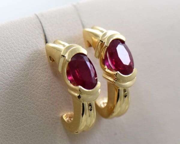 top gem natural ruby earrings set in yellow gold j hoops 2ctw ovals 2.JPG