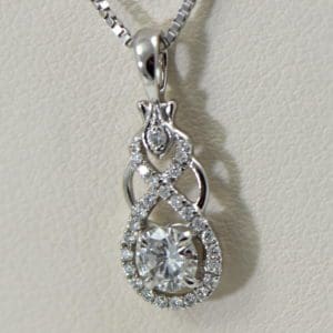 custom white gold and diamond pendant with .25ct diamond center 2.JPG