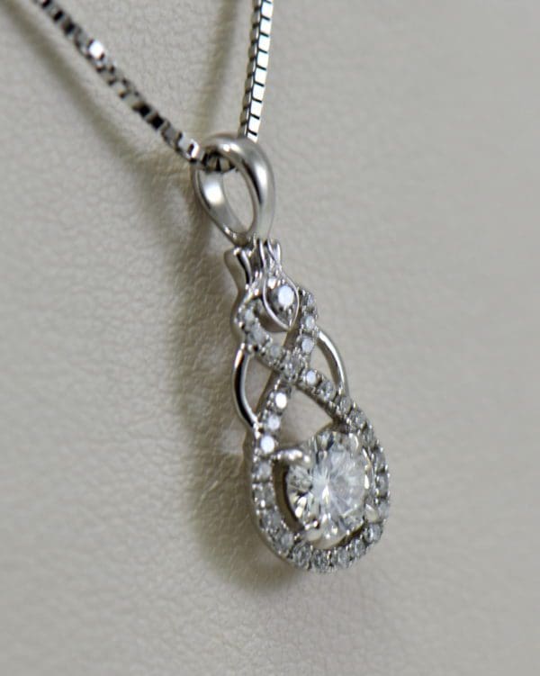 custom white gold and diamond pendant with .25ct diamond center 3.JPG