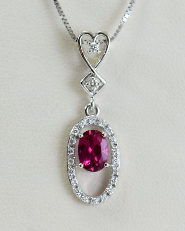 estate rubellite pink tourmaline and diamond halo pendant.JPG