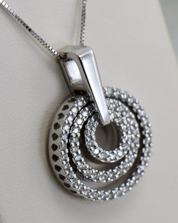 large estate diamond pendant with movable diamond circles 2.JPG
