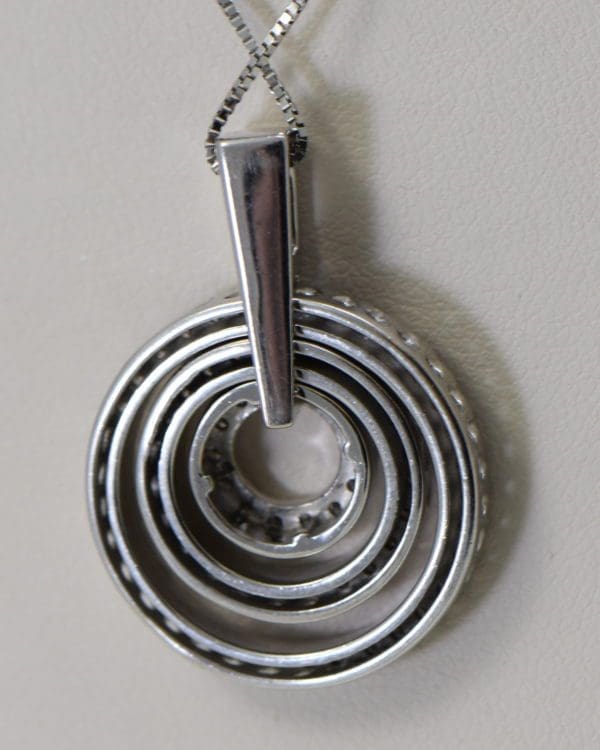 large estate diamond pendant with movable diamond circles 5.JPG