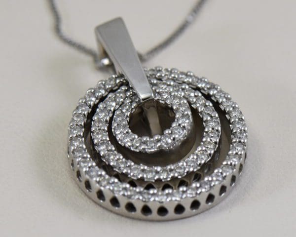 large estate diamond pendant with movable diamond circles 6.JPG