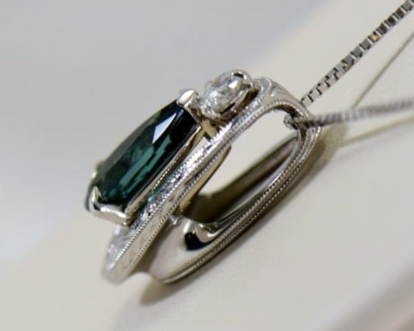 teal tourmaline and diamond slide pendant in white gold.JPG