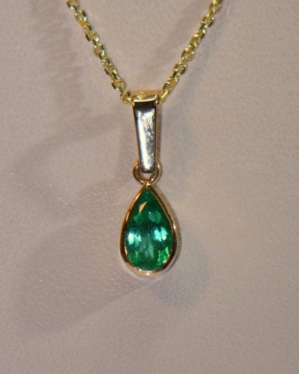1ct pear colombian emerald pendant bezel set in 18k gold.JPG