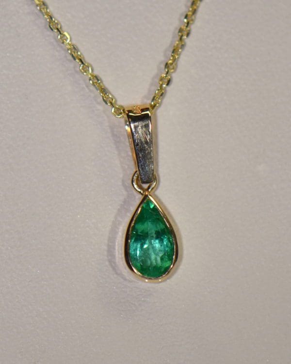 1ct pear colombian emerald pendant bezel set in 18k gold 3.JPG