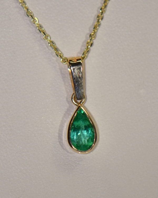 1ct pear colombian emerald pendant bezel set in 18k gold 3.JPG