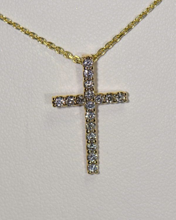 classic yellow gold diamond cross necklace hidden bail.JPG