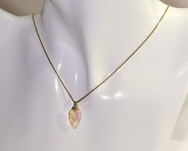 gold opal pendant with ethiopian opal drop 4.JPG