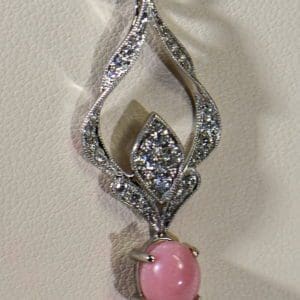 pink conch pearl custom pendant with diamonds 3.JPG