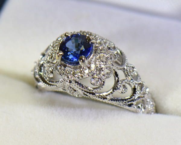 vintage inspired filigree dome ring with round blue sapphire and diamond halo 3.JPG