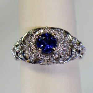 vintage inspired filigree dome ring with round blue sapphire and diamond halo 6.JPG