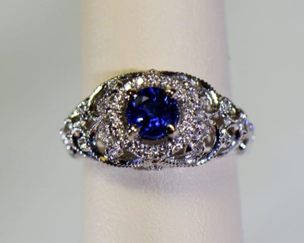 vintage inspired filigree dome ring with round blue sapphire and diamond halo 6.JPG