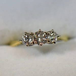 antique old euro cut diamond three stone ring yellow gold shank.JPG