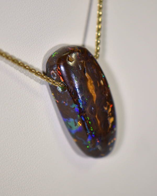 australian boulder opal drilled slide pendant on 18k gold chain 3.JPG