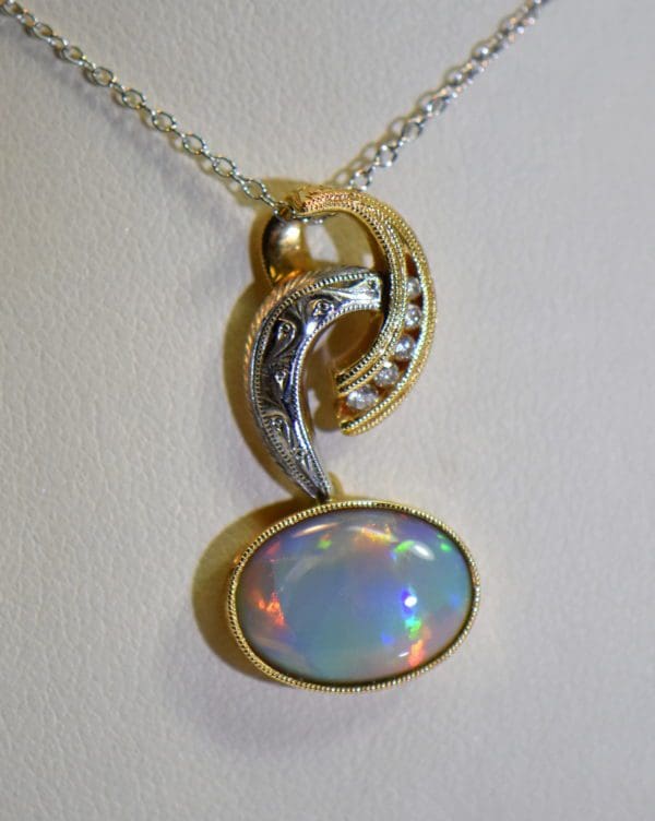 custom twotone opal pendant with australian grey base opal multicolor broadflash.JPG