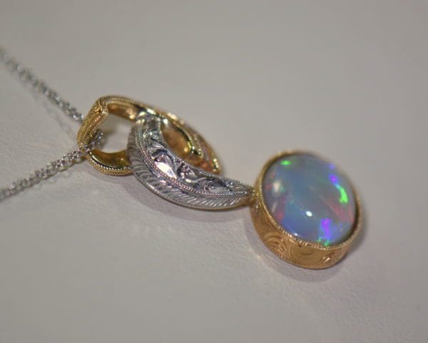 custom twotone opal pendant with australian grey base opal multicolor broadflash 4.JPG