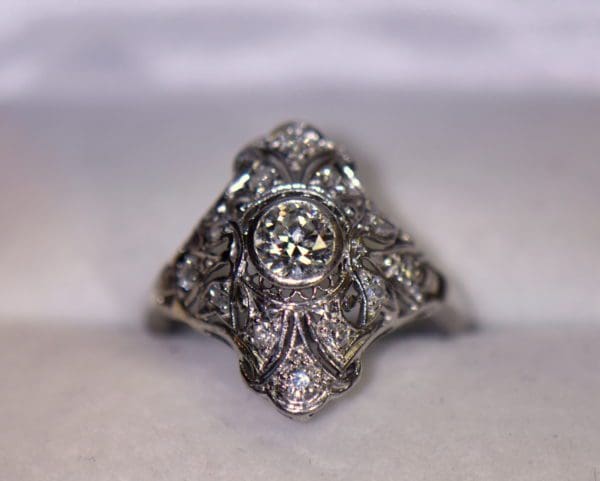 edwardian platinum diamond bezel set filigree dinner ring.JPG