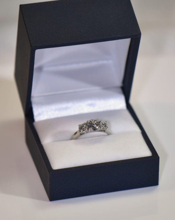 white gold .75ct round center diamond three stone ring ags certified diamonds 3.JPG