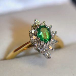 estate oval natural gem emerald diamond halo ring.JPG