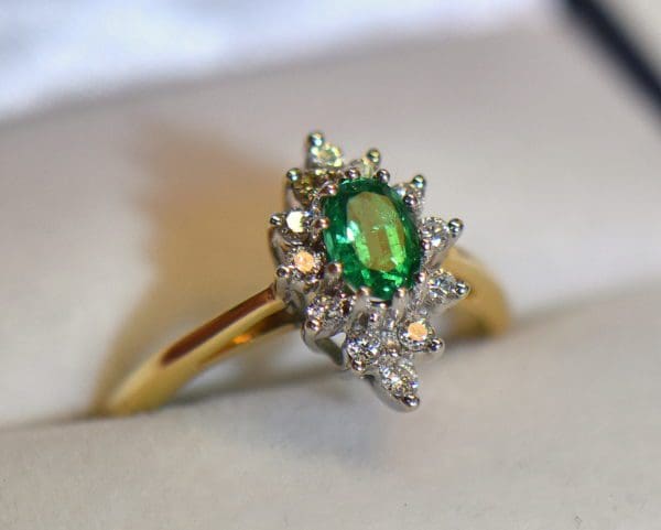 estate oval natural gem emerald diamond halo ring.JPG