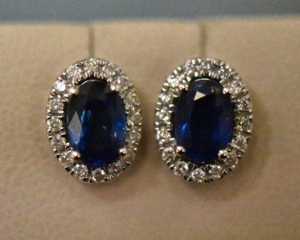 kallati oval blue sapphire and diamond halo stud earrings