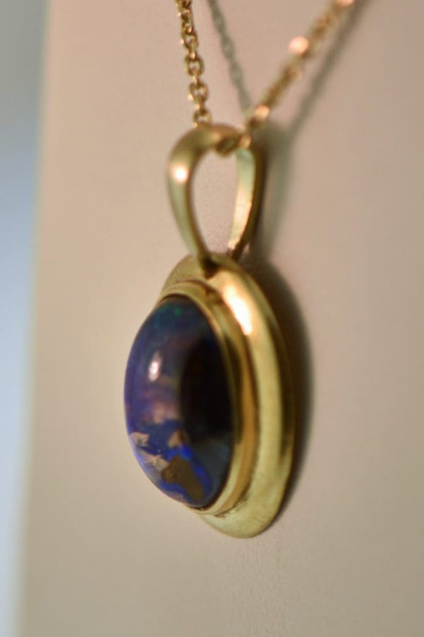 boulder opal pendant in 18k gold frame 2