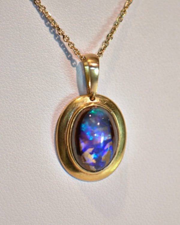 boulder opal pendant in 18k gold frame 5