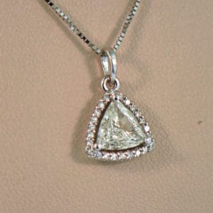 custom triangle pendant with trilliant diamond halo 5
