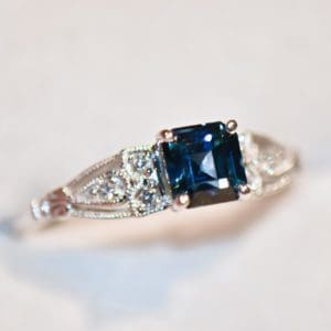 emerald cut teal sapphire bicolor engagement ring 2