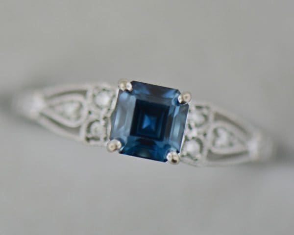 emerald cut teal sapphire bicolor engagement ring 3
