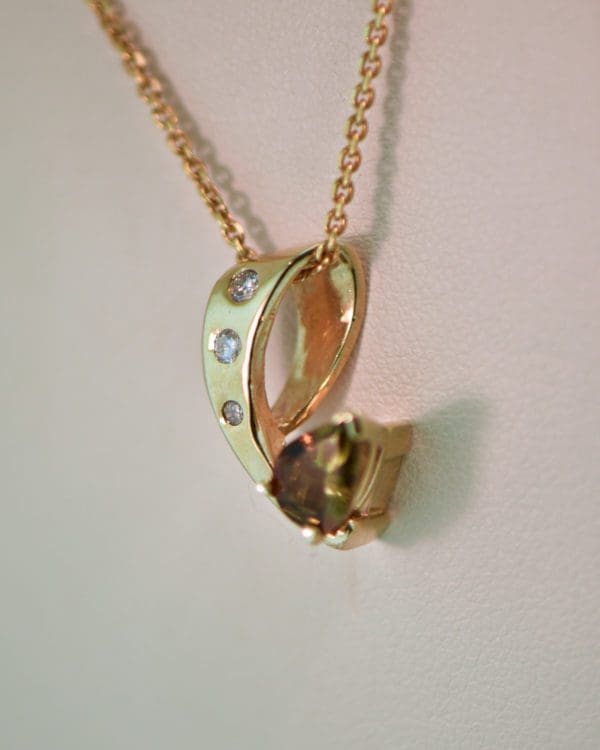 estate andalusite pendant with diamond accents 2