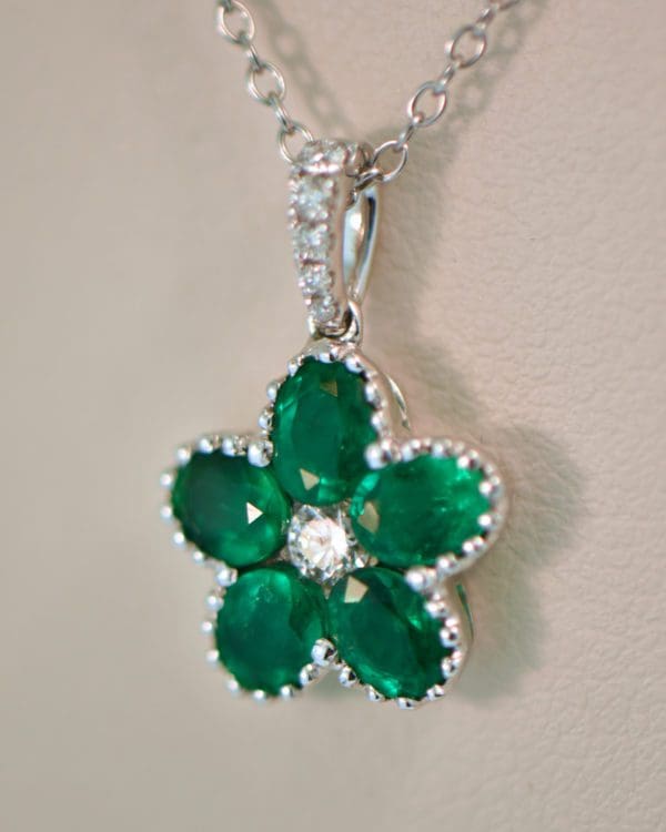 gem quality natural emerald flower pendant with diamonds