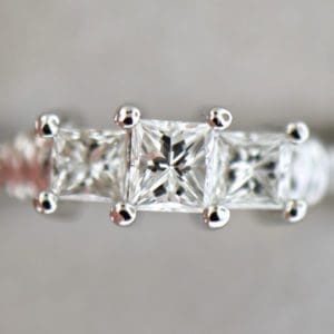 platinum three stone ring with princess cut diamonds 3