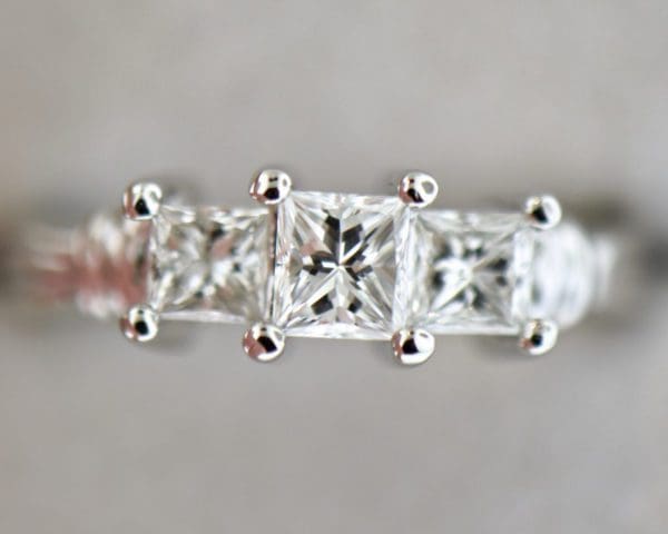 platinum three stone ring with princess cut diamonds 3
