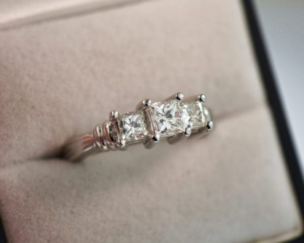 platinum three stone ring with princess cut diamonds 4