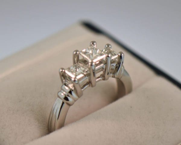 platinum three stone ring with princess cut diamonds 5