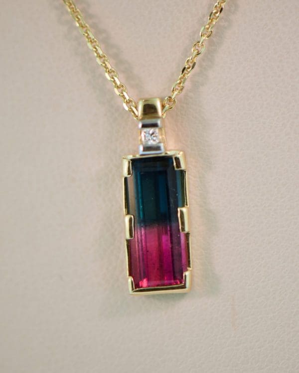 rare bicolor red blue tourmaline pendant in gold