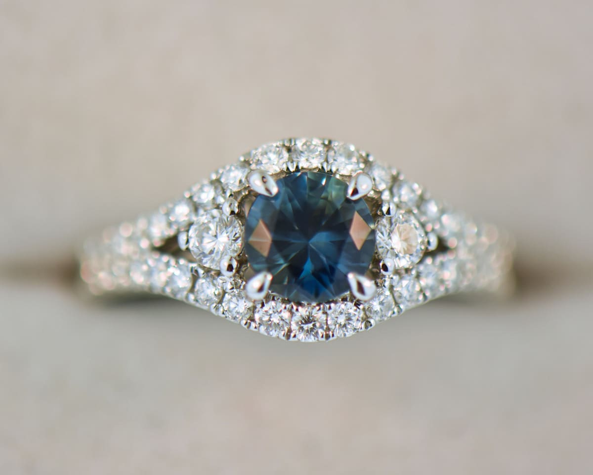 Round Teal Sapphire Ring with Diamond Accents Exquisite Jewelry