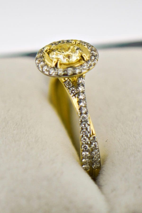 round yellow diamond engagement ring in yellow gold halo mounting 3